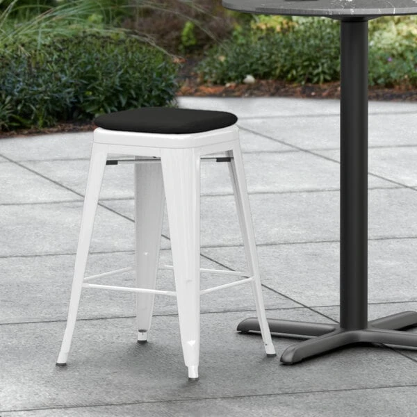 LT&S Alloy Series Lancaster Table & Seating Alloy Series White Stackable Metal Indoor / Outdoor Industrial Cafe Counter Height Stool With Black Fabric Magnetic Cushion 1 LT&S Alloy Series Lancaster Table & Seating Alloy Series White Stackable Metal Indoor / Outdoor Industrial Cafe Counter Height Stool With Black Fabric Magnetic Cushion