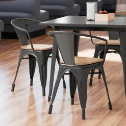LT&S Alloy Series Lancaster Table & Seating Alloy Series Black Metal Indoor Industrial Cafe Arm Chair With Natural Wooden Seat