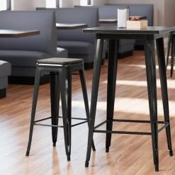 LT&S Alloy Series Lancaster Table & Seating Alloy Series Distressed Black Metal Indoor Industrial Cafe Bar Height Stool With Black Wood Seat
