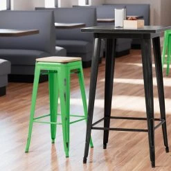 LT&S Alloy Series Lancaster Table & Seating Alloy Series Distressed Green Stackable Metal Indoor Industrial Barstool With Natural Wood Seat