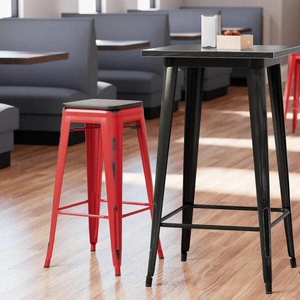 LT&S Alloy Series Lancaster Table & Seating Alloy Series Distressed Red Metal Indoor Industrial Cafe Bar Height Stool With Black Wood Seat 1 LT&S Alloy Series Lancaster Table & Seating Alloy Series Distressed Red Metal Indoor Industrial Cafe Bar Height Stool With Black Wood Seat
