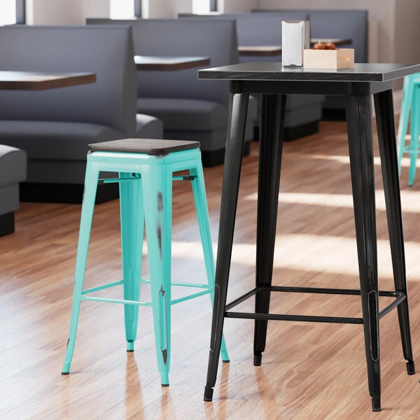 LT&S Alloy Series Lancaster Table & Seating Alloy Series Distressed Seafoam Stackable Metal Indoor Industrial Barstool With Black Wood Seat 1 LT&S Alloy Series Lancaster Table & Seating Alloy Series Distressed Seafoam Stackable Metal Indoor Industrial Barstool With Black Wood Seat