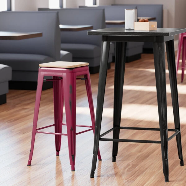 LT&S Alloy Series Lancaster Table & Seating Alloy Series Distressed Sangria Stackable Metal Indoor Industrial Barstool With Natural Wood Seat 1 LT&S Alloy Series Lancaster Table & Seating Alloy Series Distressed Sangria Stackable Metal Indoor Industrial Barstool With Natural Wood Seat
