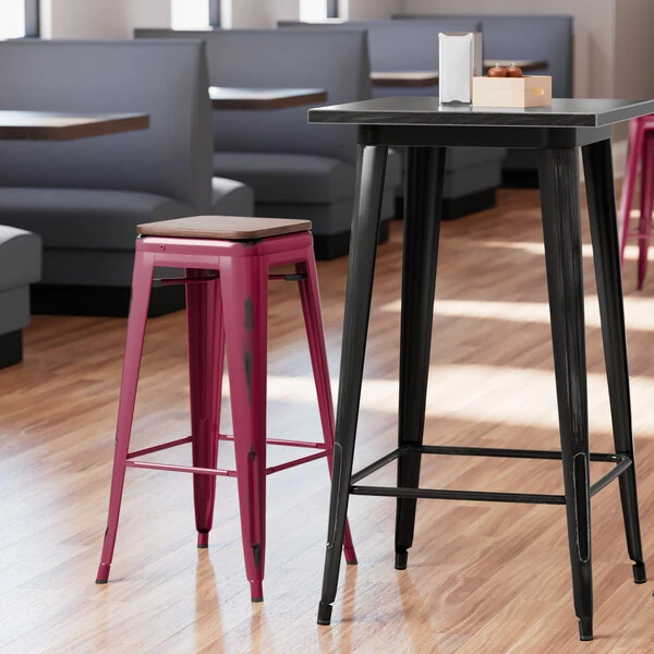LT&S Alloy Series Lancaster Table & Seating Alloy Series Distressed Sangria Stackable Metal Indoor Industrial Barstool With Walnut Wood Seat 1 LT&S Alloy Series Lancaster Table & Seating Alloy Series Distressed Sangria Stackable Metal Indoor Industrial Barstool With Walnut Wood Seat