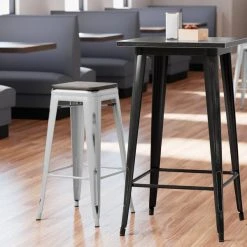 LT&S Alloy Series Lancaster Table & Seating Alloy Series Distressed Silver Stackable Metal Indoor Industrial Barstool With Black Wood Seat