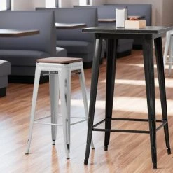 LT&S Alloy Series Lancaster Table & Seating Alloy Series Distressed Silver Stackable Metal Indoor Industrial Barstool With Walnut Wood Seat