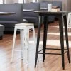 LT&S Alloy Series Lancaster Table & Seating Alloy Series Distressed White Stackable Metal Indoor Industrial Barstool With Natural Wood Seat