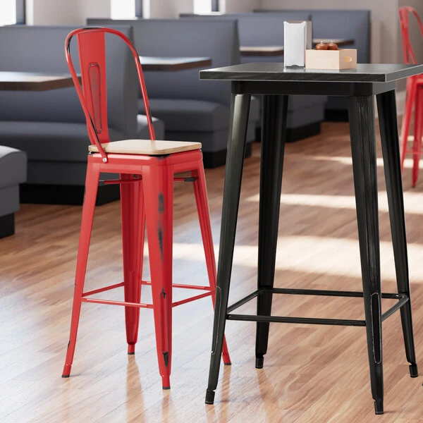 LT&S Alloy Series Lancaster Table & Seating Alloy Series Distressed Red Metal Indoor Industrial Cafe Bar Height Stool With Vertical Slat Back And Natural Wood Seat 1 LT&S Alloy Series Lancaster Table & Seating Alloy Series Distressed Red Metal Indoor Industrial Cafe Bar Height Stool With Vertical Slat Back And Natural Wood Seat
