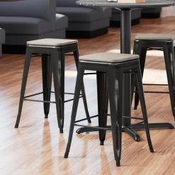 LT&S Alloy Series Lancaster Table & Seating Alloy Series Distressed Black Metal Indoor Industrial Cafe Counter Height Stool With Gray Wood Seat