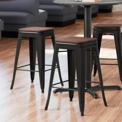 LT&S Alloy Series Lancaster Table & Seating Alloy Series Black Metal Indoor Industrial Cafe Counter Height Stool With Walnut Wood Seat