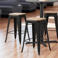 LT&S Alloy Series Lancaster Table & Seating Alloy Series Black Metal Indoor Industrial Cafe Counter Height Stool With Natural Wood Seat