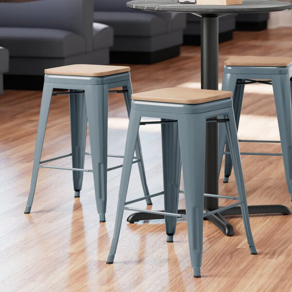 LT&S Alloy Series Lancaster Table & Seating Alloy Series Charcoal Metal Indoor Industrial Cafe Counter Height Stool With Natural Wood Seat 1 LT&S Alloy Series Lancaster Table & Seating Alloy Series Charcoal Metal Indoor Industrial Cafe Counter Height Stool With Natural Wood Seat