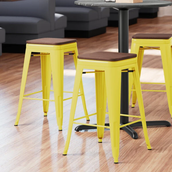 LT&S Alloy Series Lancaster Table & Seating Alloy Series Yellow Metal Indoor Industrial Cafe Counter Height Stool With Walnut Wood Seat 1 LT&S Alloy Series Lancaster Table & Seating Alloy Series Yellow Metal Indoor Industrial Cafe Counter Height Stool With Walnut Wood Seat