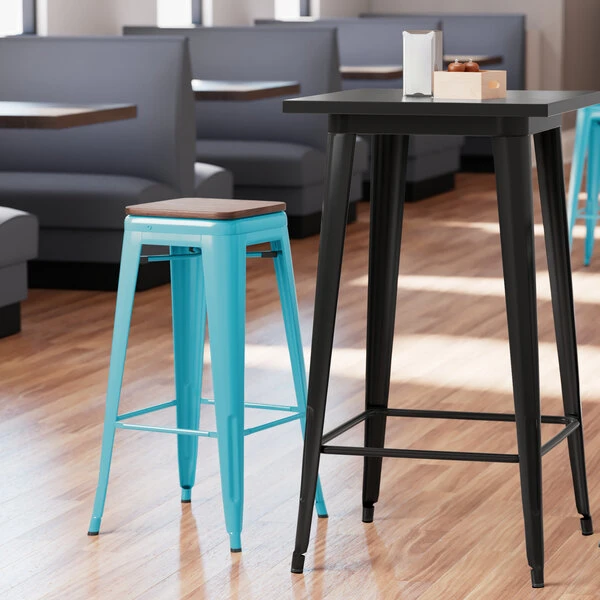 LT&S Alloy Series Lancaster Table & Seating Alloy Series Arctic Blue Metal Indoor Industrial Cafe Bar Height Stool With Walnut Wood Seat 1 LT&S Alloy Series Lancaster Table & Seating Alloy Series Arctic Blue Metal Indoor Industrial Cafe Bar Height Stool With Walnut Wood Seat