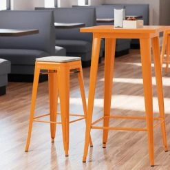 LT&S Alloy Series Lancaster Table & Seating Alloy Series Orange Stackable Metal Indoor Industrial Barstool With Gray Wood Seat