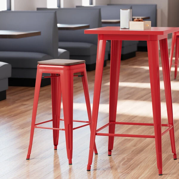 LT&S Alloy Series Lancaster Table & Seating Alloy Series Red Metal Indoor Industrial Cafe Bar Height Stool With Walnut Wood Seat 1 LT&S Alloy Series Lancaster Table & Seating Alloy Series Red Metal Indoor Industrial Cafe Bar Height Stool With Walnut Wood Seat