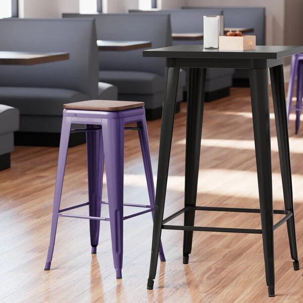 LT&S Alloy Series Lancaster Table & Seating Alloy Series Purple Metal Indoor Industrial Cafe Bar Height Stool With Walnut Wood Seat 1 LT&S Alloy Series Lancaster Table & Seating Alloy Series Purple Metal Indoor Industrial Cafe Bar Height Stool With Walnut Wood Seat