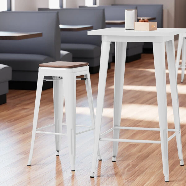 LT&S Alloy Series Lancaster Table & Seating Alloy Series White Metal Indoor Industrial Cafe Bar Height Stool With Walnut Wood Seat 1 LT&S Alloy Series Lancaster Table & Seating Alloy Series White Metal Indoor Industrial Cafe Bar Height Stool With Walnut Wood Seat
