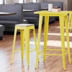 LT&S Alloy Series Lancaster Table & Seating Alloy Series Yellow Stackable Metal Indoor Industrial Barstool With Gray Wood Seat