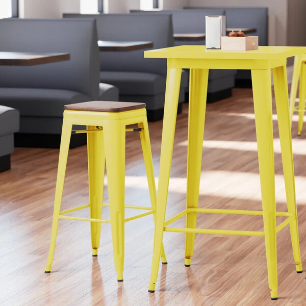 LT&S Alloy Series Lancaster Table & Seating Alloy Series Yellow Metal Indoor Industrial Cafe Bar Height Stool With Walnut Wood Seat 1 LT&S Alloy Series Lancaster Table & Seating Alloy Series Yellow Metal Indoor Industrial Cafe Bar Height Stool With Walnut Wood Seat