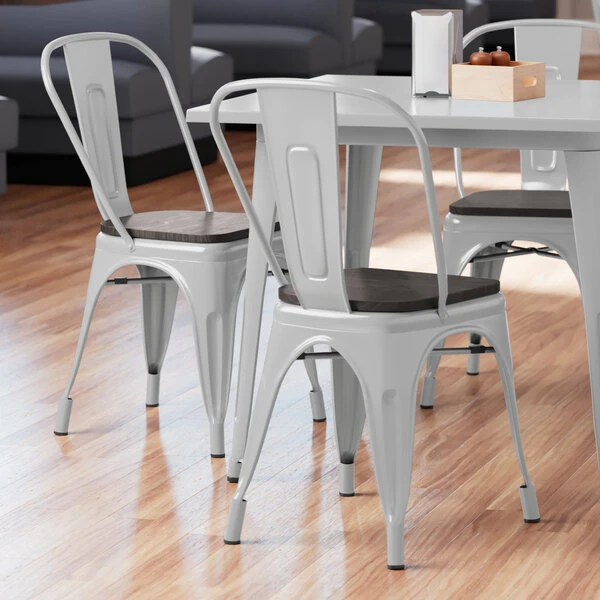 LT&S Alloy Series Lancaster Table & Seating Alloy Series Silver Metal Indoor Industrial Cafe Chair With Vertical Slat Back And Black Wood Seat 1 LT&S Alloy Series Lancaster Table & Seating Alloy Series Silver Metal Indoor Industrial Cafe Chair With Vertical Slat Back And Black Wood Seat