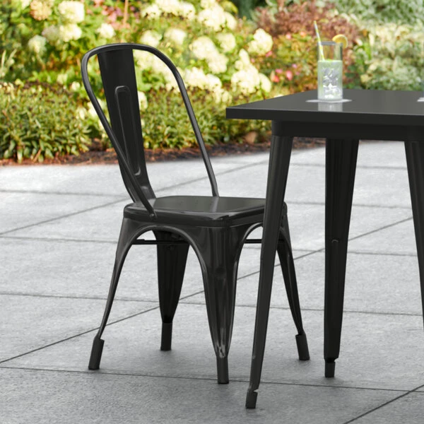 LT&S Alloy Series Lancaster Table & Seating Alloy Series Black Metal Indoor / Outdoor Industrial Cafe Chair With Vertical Slat Back And Drain Hole Seat 1 LT&S Alloy Series Lancaster Table & Seating Alloy Series Black Metal Indoor / Outdoor Industrial Cafe Chair With Vertical Slat Back And Drain Hole Seat