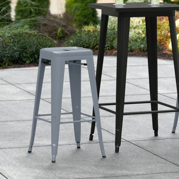 LT&S Alloy Series Lancaster Table & Seating Alloy Series Charcoal Stackable Metal Indoor / Outdoor Industrial Barstool With Drain Hole Seat 1 LT&S Alloy Series Lancaster Table & Seating Alloy Series Charcoal Stackable Metal Indoor / Outdoor Industrial Barstool With Drain Hole Seat