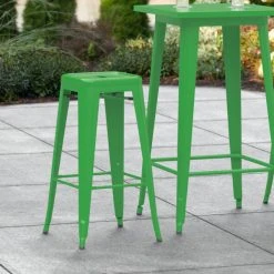 LT&S Alloy Series Lancaster Table & Seating Alloy Series Green Stackable Metal Indoor / Outdoor Industrial Barstool With Drain Hole Seat