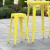 LT&S Alloy Series Lancaster Table & Seating Alloy Series Yellow Stackable Metal Indoor / Outdoor Industrial Barstool With Drain Hole Seat