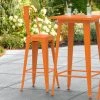 LT&S Alloy Series Lancaster Table & Seating Alloy Series Orange Metal Indoor / Outdoor Industrial Cafe Barstool With Vertical Slat Back And Drain Hole Seat