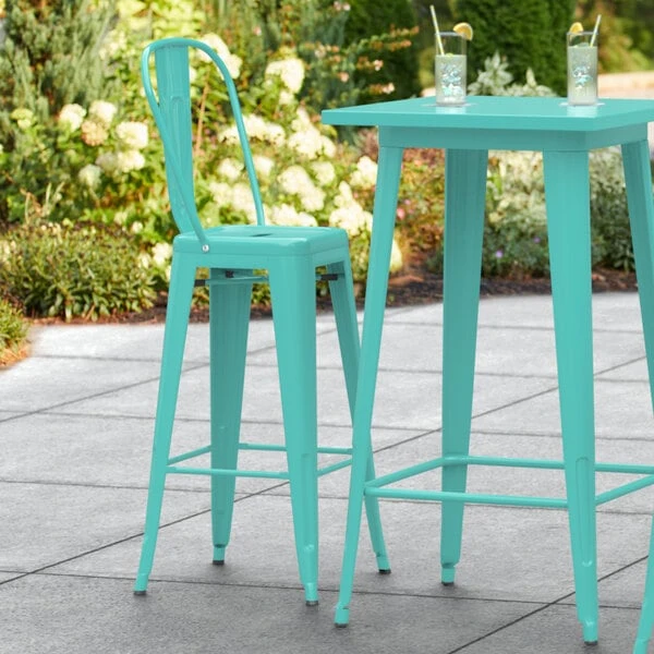 LT&S Alloy Series Lancaster Table & Seating Alloy Series Seafoam Metal Indoor / Outdoor Industrial Cafe Barstool With Vertical Slat Back And Drain Hole Seat 1 LT&S Alloy Series Lancaster Table & Seating Alloy Series Seafoam Metal Indoor / Outdoor Industrial Cafe Barstool With Vertical Slat Back And Drain Hole Seat