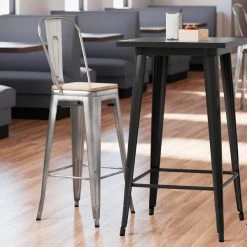 LT&S Alloy Series Lancaster Table & Seating Alloy Series Clear Coated Metal Indoor Industrial Cafe Bar Height Stool With Vertical Slat Back And Natural Wood Seat