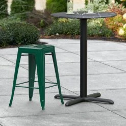 LT&S Alloy Series Lancaster Table & Seating Alloy Series Emerald Stackable Metal Indoor / Outdoor Industrial Cafe Counter Height Stool With Drain Hole Seat