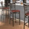 LT&S Spartan Series Lancaster Table & Seating Spartan Series Bar Height Metal Ladder Back Chair With Walnut Wood Grain Finish And Burgundy Vinyl Seat