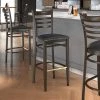 LT&S Spartan Series Lancaster Table & Seating Spartan Series Bar Height Metal Ladder Back Chair With Walnut Wood Grain Finish And Black Vinyl Seat