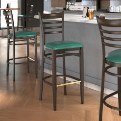 LT&S Spartan Series Lancaster Table & Seating Spartan Series Bar Height Metal Ladder Back Chair With Walnut Wood Grain Finish And Green Vinyl Seat