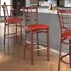 LT&S Spartan Series Lancaster Table & Seating Spartan Series Bar Height Metal Window Back Chair With Mahogany Wood Grain Finish And Red Vinyl Seat