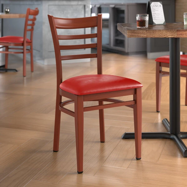 LT&S Spartan Series Lancaster Table & Seating Spartan Series Metal Ladder Back Chair With Mahogany Wood Grain Finish And Red Vinyl Seat 1 LT&S Spartan Series Lancaster Table & Seating Spartan Series Metal Ladder Back Chair With Mahogany Wood Grain Finish And Red Vinyl Seat