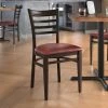 LT&S Spartan Series Lancaster Table & Seating Spartan Series Metal Ladder Back Chair With Walnut Wood Grain Finish And Burgundy Vinyl Seat