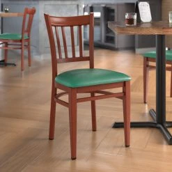 LT&S Spartan Series Lancaster Table & Seating Spartan Series Metal Slat Back Chair With Mahogany Wood Grain Finish And Green Vinyl Seat