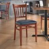 LT&S Spartan Series Lancaster Table & Seating Spartan Series Metal Slat Back Chair With Mahogany Wood Grain Finish And Navy Vinyl Seat