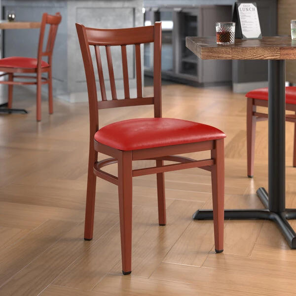 LT&S Spartan Series Lancaster Table & Seating Spartan Series Metal Slat Back Chair With Mahogany Wood Grain Finish And Red Vinyl Seat 1 LT&S Spartan Series Lancaster Table & Seating Spartan Series Metal Slat Back Chair With Mahogany Wood Grain Finish And Red Vinyl Seat