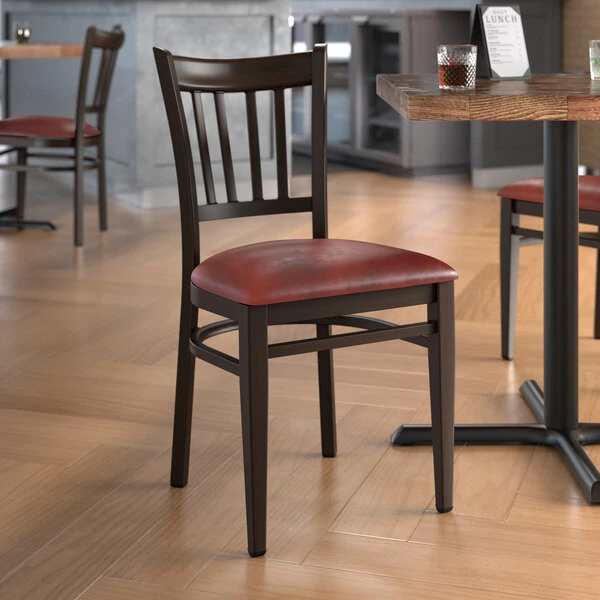LT&S Spartan Series Lancaster Table & Seating Spartan Series Metal Slat Back Chair With Walnut Wood Grain Finish And Burgundy Vinyl Seat 1 LT&S Spartan Series Lancaster Table & Seating Spartan Series Metal Slat Back Chair With Walnut Wood Grain Finish And Burgundy Vinyl Seat