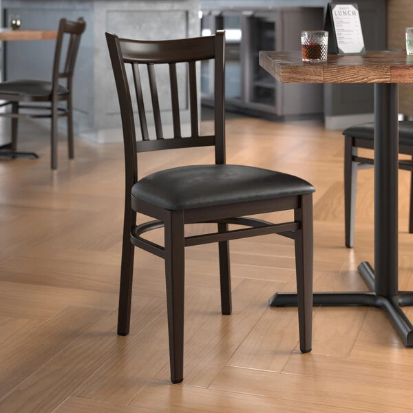 LT&S Spartan Series Lancaster Table & Seating Spartan Series Metal Slat Back Chair With Walnut Wood Grain Finish And Black Vinyl Seat 1 LT&S Spartan Series Lancaster Table & Seating Spartan Series Metal Slat Back Chair With Walnut Wood Grain Finish And Black Vinyl Seat